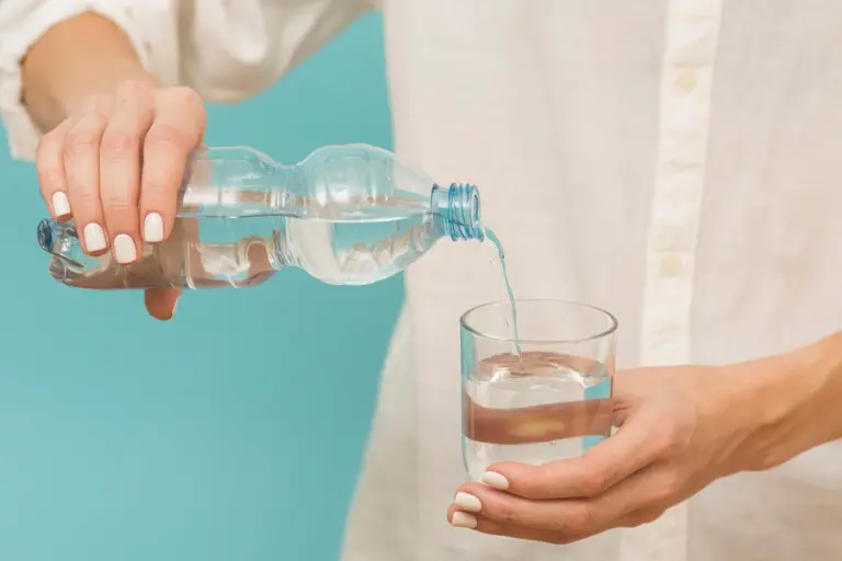 woman_pouring_water_into_glass_23_2148728795